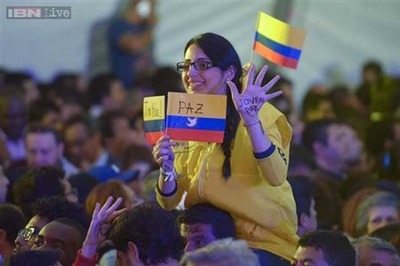 Santos re-elected Colombia president in peace vote