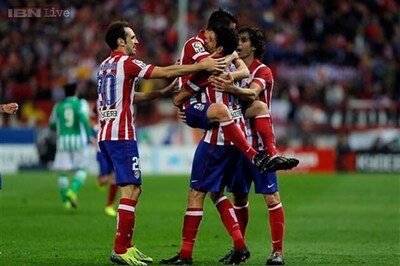 Atletico Madrid thrash Betis to stay just behind Barcelona