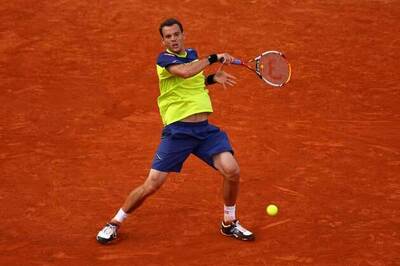 Mathieu outlasts Isner in marathon five sets