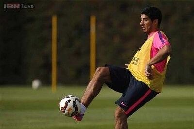Luis Suarez trains for first time with Barcelona
