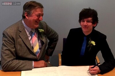 Actor Stephen Fry ties the knot with partner Elliott Spencer