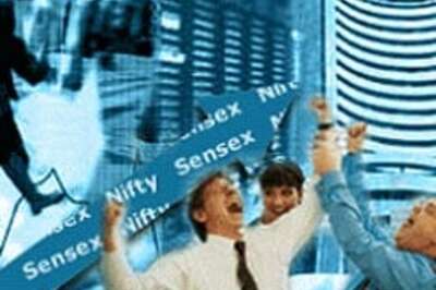 Sensex closes above 13,700 level