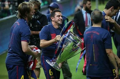 Xavi Hernandez ends Barcelona career in style with European triumph