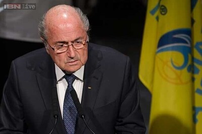 Sepp Blatter defies calls to quit as FIFA scandal widens
