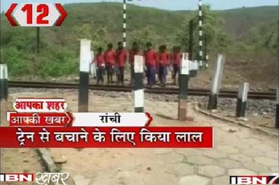 School uses red coloured uniform to save students from trains