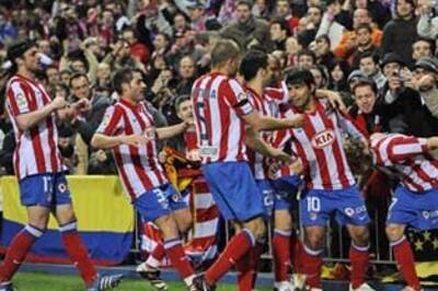 Atletico Madrid unleash late hell to sink Barcelona