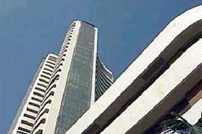 Markets close with smart gain, Sensex above 18K