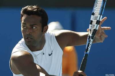 Paes, Bhupathi advance in mixed doubles