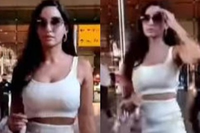 Nora Fatehi Looks Gorgeous in White Crop Top and Skirt at Airport, Stops to Grab Selfie with Fan