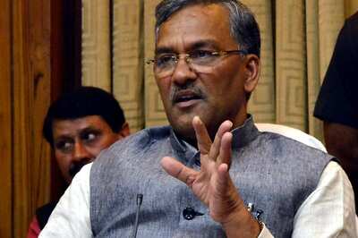 Amid Rumours of Change in Guard, U'khand CM Rawat Reaches Dehradun to Sea of Supporters