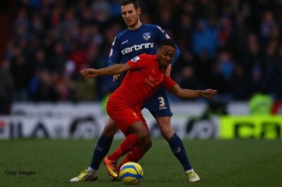 Liverpool winger Sterling charged with assaulting woman