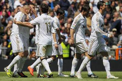 Madrid ease past Sevilla to edge closer to title