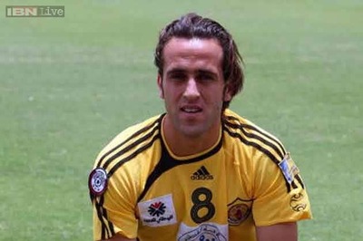 Iranian football legend Ali Karimi hangs up boots