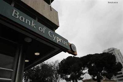 Cyprus details heavy losses for major bank customers