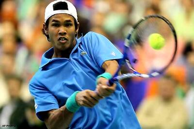 Paes and Somdev progress, Divij-Raja pair bows out