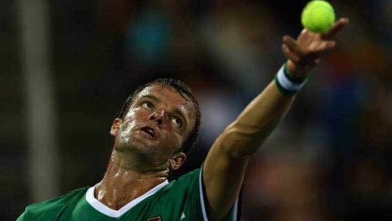 Teymuraz Gabashvili, Jarkko Nieminen advance at Stockholm Open