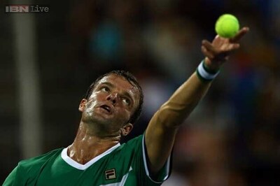 Teymuraz Gabashvili, Jarkko Nieminen advance at Stockholm Open