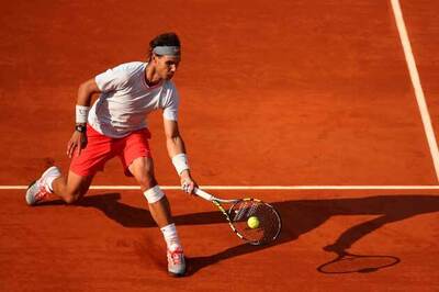 Vulnerable Nadal, Djokovic advance at French Open
