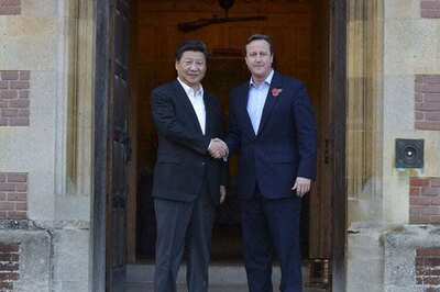 David Cameron takes Xi Jinping to the pub for fish and chips