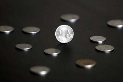 Rupee at a high of 54.72 against dollar; up  by 71 paise
