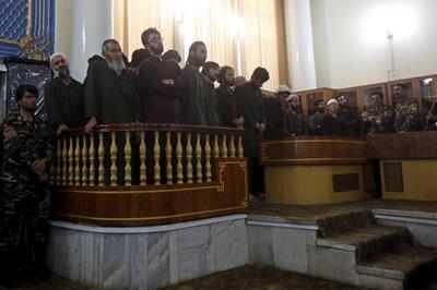Afghan judge sentences four to death for mob killing of woman
