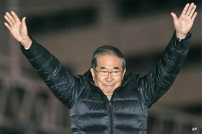 Conservative party favored as voting in Japan begins