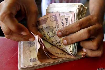 Rupee drops to 2-week low vs US dollar after Fed sticks to low rates