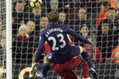 Arsenal's Arshavin inflicts more suffering on Liverpool