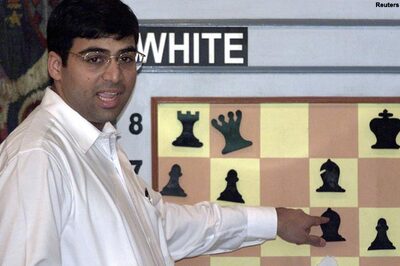 Anand held by Gashimov; Carlsen claims title