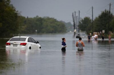 Floodwater Recedes in Houston to Reveal Imelda's Trail of Destruction, 5 Deaths Reported