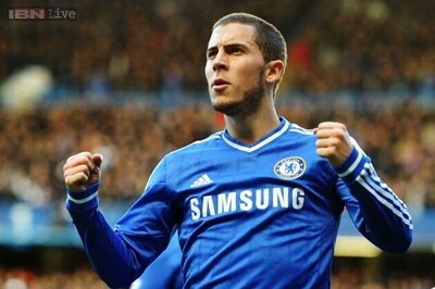 Hazard treble puts Chelsea top with Newcastle win