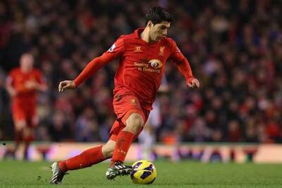 Arsenal bid 40m pound plus 1 pound for Luis Suarez