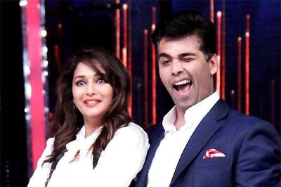 Snapshot: Is Madhuri Dixit surprised to see Karan Johar dance?