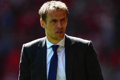 Phil Neville returns to Manchester United as coach