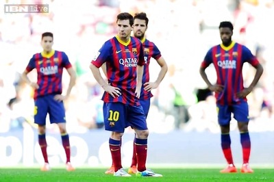 Barcelona's title defense hit by 2-2 draw to Getafe