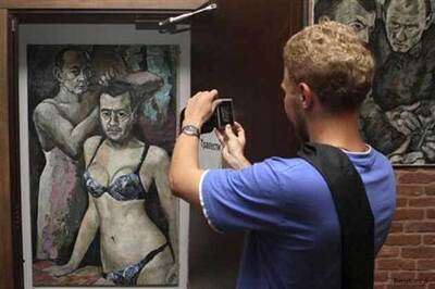 Russian police seize painting of Putin in women's underwear