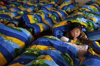 Beijing eases one child norm as China adopts new policy