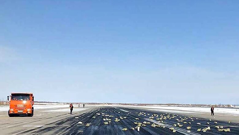 Gold Bars Spill on Russian Runway After Plane Door Opens Up