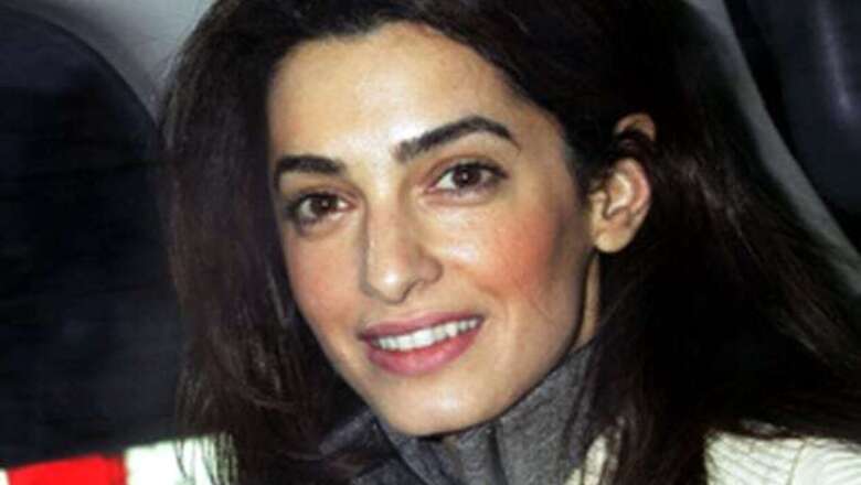 Did Amal Alamuddin play 'hard to get' with George Clooney?