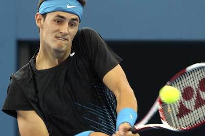 Tomic beats Monfils to reach Kooyong final