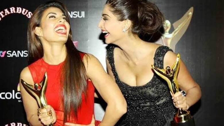 Sonam Kapoor poses with her 'date' Jacqueline Fernandez on the red carpet at the Colors Stardust Awards