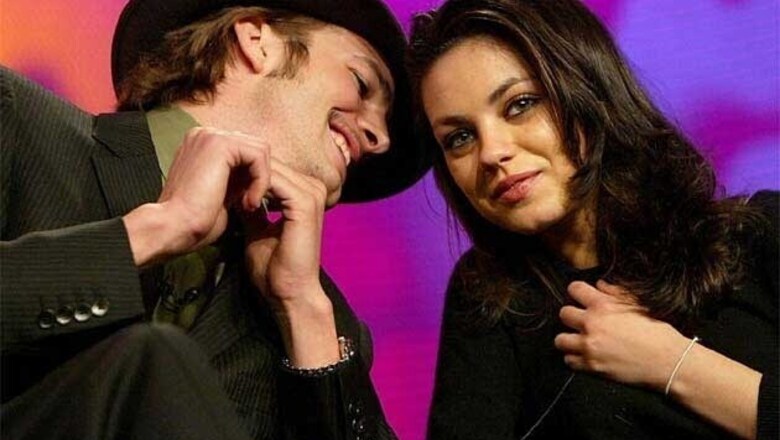 Ashton Kutcher doting on his pregnant fiancee Mila Kunis