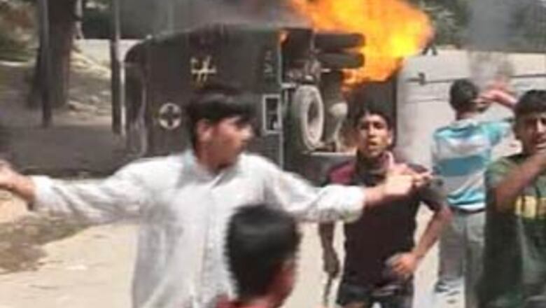 Kashmir still on the boil, mob torches CRPF vehicle