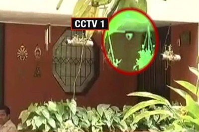 CCTV Shows a Person With Helmet Coming to the Gate And Firing at Gauri Lankesh