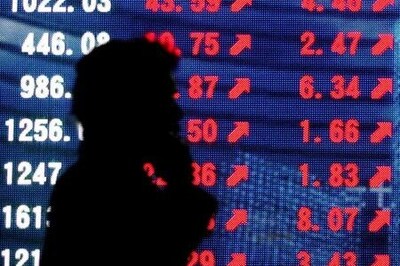 Global Markets: Asian stocks slump, gold jumps after dovish Fed