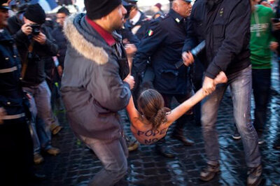 Papal conclave: Topless women protest outside Vatican