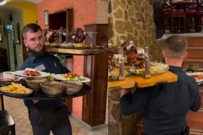 This Waiter Carrying Heavy Load Of Food Might Give You Second-Hand Arm Ache
