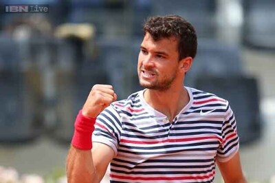 Grigor Dimitrov overcomes sweaty hands to advance in Rome